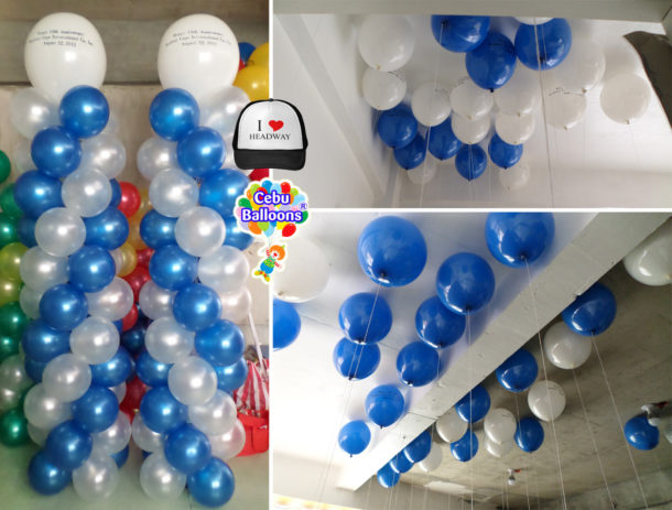 Blue and White Tall Pillars and Floating Balloons for Headway Caps Anniversary