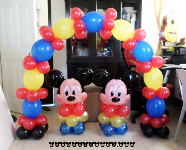 Mickey Mouse Centerpieces with Tall Cake Arch