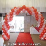 Red & White Balloon Entrance Arch (Double Rotation) at Montebello